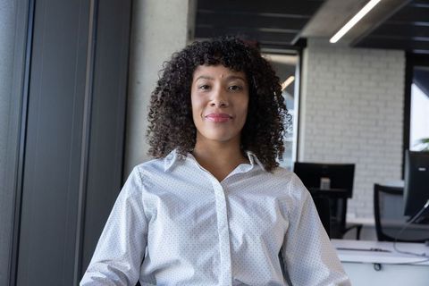 Confident Businesswoman in Contemporary Office