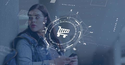 Young woman using smartphone with augmented reality shopping cart hud in mall concourse