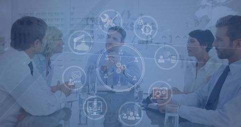 Business Team Engaged in Strategic Meeting with Technology Integration