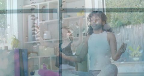 Meditating Teens Behind Raindrop-Covered Window Indicating Tranquility - Download Free Stock Images Pikwizard.com