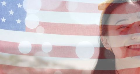 Joyful Celebration Under American Flag at Beach - Download Free Stock Images Pikwizard.com