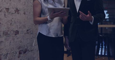 Business Professionals Collaborating with Digital Tablet - Download Free Stock Images Pikwizard.com