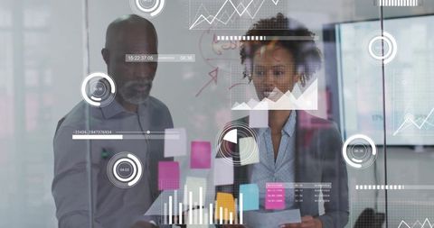 diverse colleagues analyzing futuristic digital data at office - Download Free Stock Images Pikwizard.com