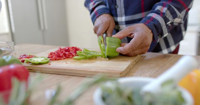 Person Chopping Green Bell Pepper in Home Kitchen - Download Free Stock Images Pikwizard.com