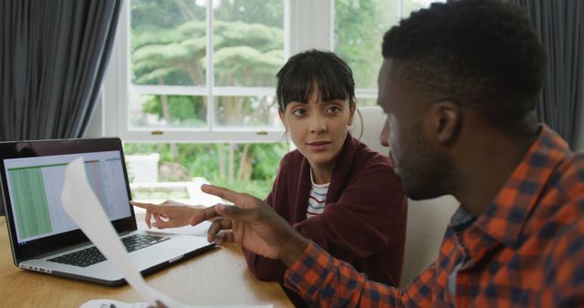 Colleagues Discussing Data Analysis on Laptop in Home Office - Download Free Stock Images Pikwizard.com