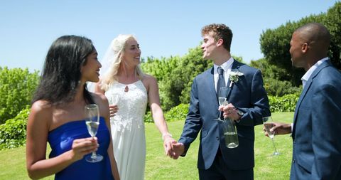 Joyful wedding celebration in lush garden setting