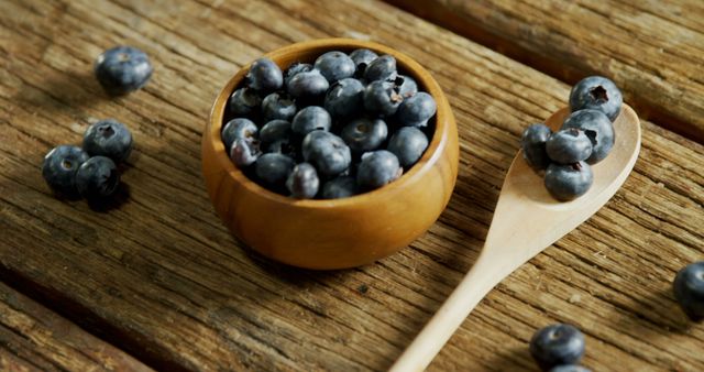 Close-up of blueberries on wooden table 4k