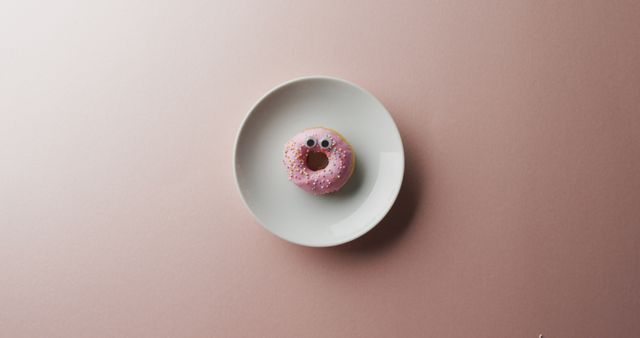 Cute Pink Donut with Googly Eyes on White Plate - Download Free Stock Images Pikwizard.com