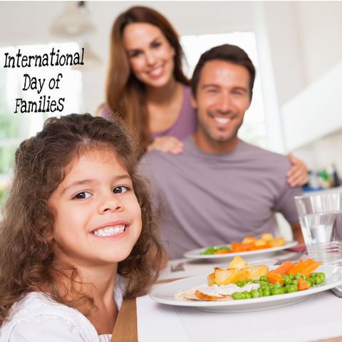 Joyful Family Celebrating International Day of Families with Meal
