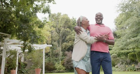 Happy Senior African American Couple Embracing in Garden - Download Free Stock Images Pikwizard.com