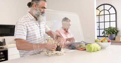 Mature couple preparing grocery haul at modern kitchen island with holographic smart display