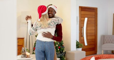 Diverse Couple Enjoying Christmas Celebration at Home
