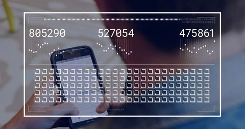 Hand Tapping Smartphone with Digital HUD Overlay Showing Numeric Dashboard and Metrics