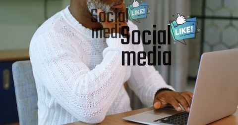 Middle-aged entrepreneur working on laptop in cozy office