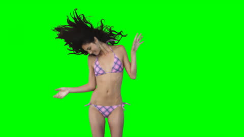 Woman in Bikini Jumping with Joy, Green Screen Background