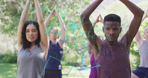 Diverse Yoga Group in Nature with Futuristic Digital Overlay