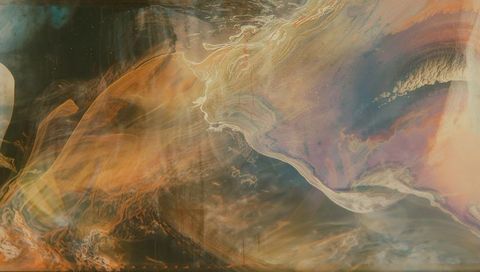 Flowing marbled waves in amber and teal with sinuous white veins and ethereal swirls