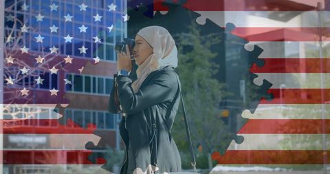 Diverse america: woman in hijab engaging in photography