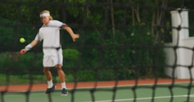 Tennis Player Focused on Returning Shot During Match - Download Free Stock Images Pikwizard.com