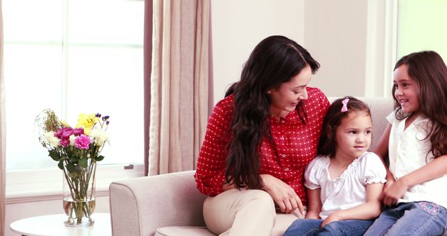 Smiling Mother Bonding with Two Daughters - Download Free Stock Images Pikwizard.com