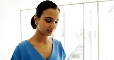 Doctor Using Digital Tablet in Modern Hospital - Download Free Stock Images Pikwizard.com