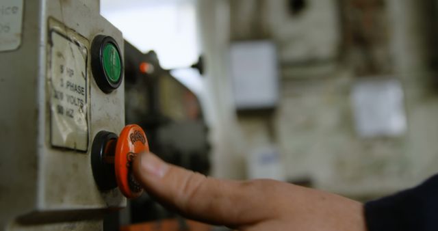 Hand Pressing Emergency Stop Button on Industrial Machine - Download Free Stock Images Pikwizard.com