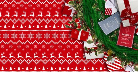Festive Christmas Gifts and Evergreen Branches on Decorative Background