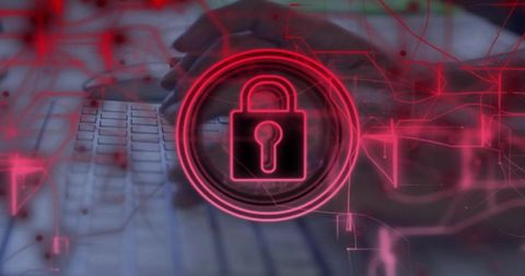 Neon padlock overlay on keyboard hands typing symbolizing cybersecurity and data encryption