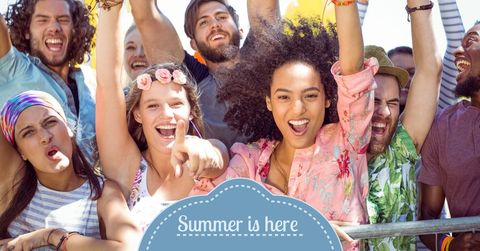 Joyful multicultural group celebrating sunny summer together