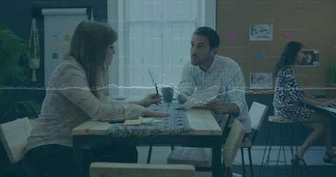 Innovative Team Collaboration with Data Analytics in Modern Office