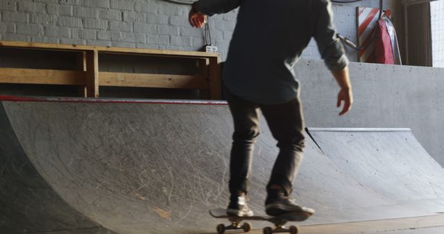 Young Skater Practicing Tricks on Indoor Skate Ramp - Download Free Stock Images Pikwizard.com