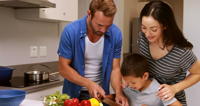 Family Preparing Meal Together in Modern Kitchen - Download Free Stock Images Pikwizard.com