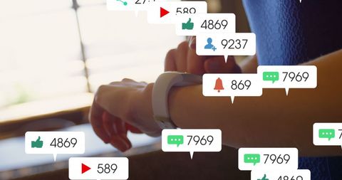 Individual Engages with Social Media Via Smartwatch Notifications