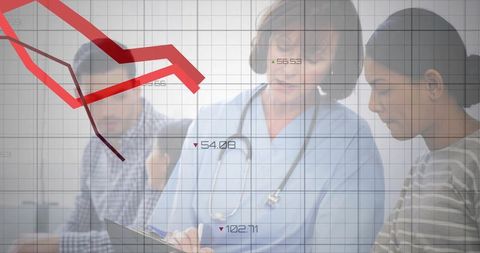 Clinician writing notes during patient consultation with red declining data overlay