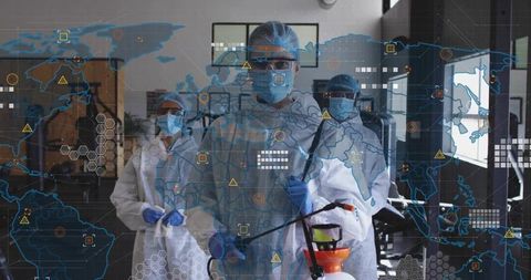 Sanitation team in protective suits using disinfection technology worldwide