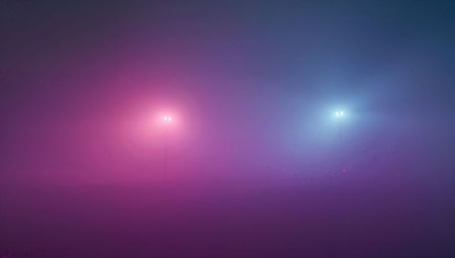 Moody Nighttime Fog with Multicolored Emitting Streetlights