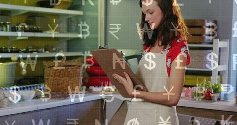 Bakery owner checking clipboard inventory with currency symbols overlay - small business