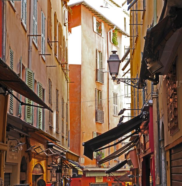 Charming European Alley with Colorful Facades and Shuttered Windows - Download Free Stock Images Pikwizard.com