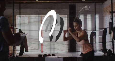 Female Athlete Training with Coach in Modern Gym Environment