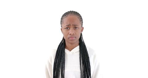 Serious black woman in white hoodie against white background