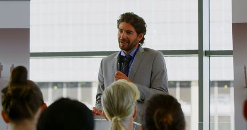 Confident Caucasian Male Giving Speech at Business Seminar - Download Free Stock Images Pikwizard.com