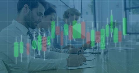 Business team analyzing candlestick stock chart overlay during collaborative office meeting