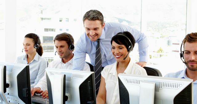 Call Center Team with Supervisor Monitoring Performance and Assisting Staff - Download Free Stock Images Pikwizard.com