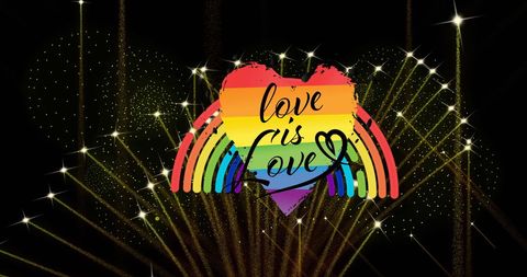 Heart-shaped rainbow with love is love text and fireworks