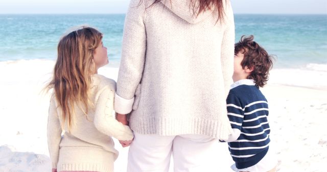 Mother and Children Holding Hands at Beach - Download Free Stock Images Pikwizard.com