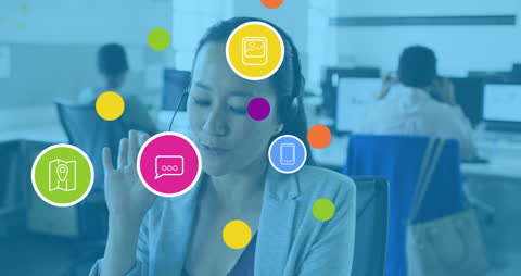 Businesswoman Engaging with Digital Communication Icons in Office