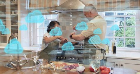 Senior couple cooking together in connected kitchen with cloud overlay and fresh vegetables