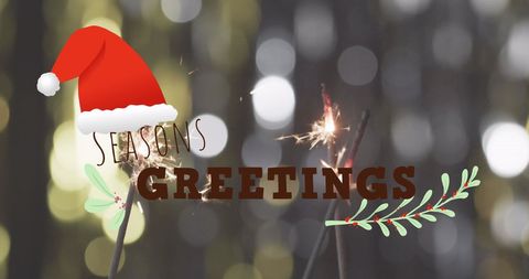 Festive christmas greetings with sparklers and santa hat