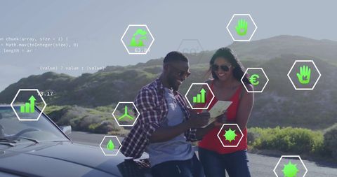 Happy Couple Enjoying Eco-Friendly Road Trip with Digital Interface