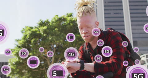 Albino Man Engaging with Smartphone and Smartwatch Digital Technology